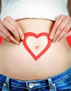 Woman suffering from stress induced gastritis